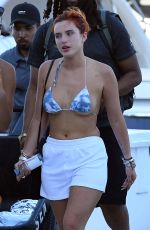 BELLA THORNE in Bikini Top Arrives at a Yacht in Miami 05/05/2021