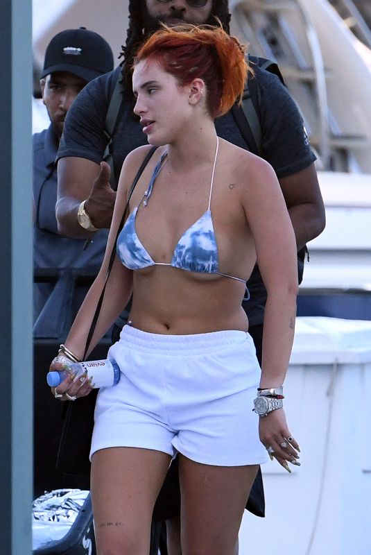 BELLA THORNE in Bikini Top Arrives at a Yacht in Miami 05/05/2021