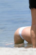 BELLA THORNE in Bikinis at a Photoshoot on the Beach in Miami 05/07/2021