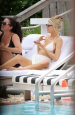 CHARLOTTE MCKINNEY in a White Bikini at a Beach in Miami 05/14/2021
