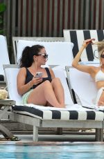 CHARLOTTE MCKINNEY in Bikini at a Pool in Miami 05/17/2021