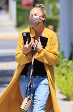 CHRISSY TEIGEN Leaves a Business Meeting in Los Angeles 05/28/2021