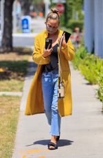 CHRISSY TEIGEN Leaves a Business Meeting in Los Angeles 05/28/2021
