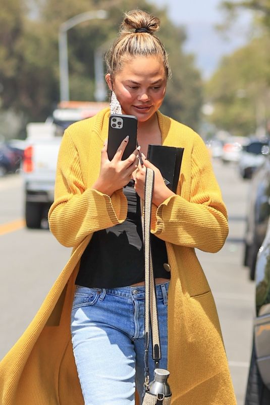 CHRISSY TEIGEN Leaves a Business Meeting in Los Angeles 05/28/2021