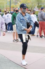 CHRISSY TEIGEN Out at Disneyland in Los Angeles 05/15/2021