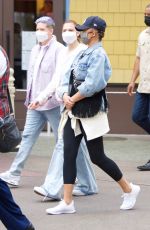 CHRISSY TEIGEN Out at Disneyland in Los Angeles 05/15/2021