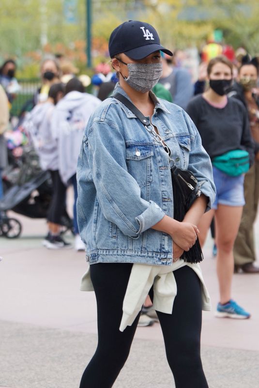 CHRISSY TEIGEN Out at Disneyland in Los Angeles 05/15/2021