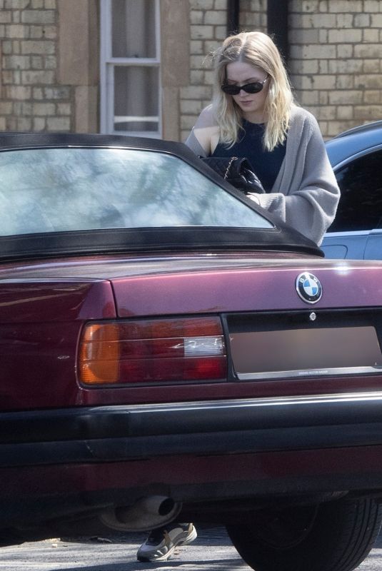 ELLIE BAMBER Out Driving Her 1980’s Classic BMW 3 Series Convertible in London 04/23/2021