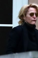 GILLIAN ANDERSON with Her Dog at a Hotel in Prague 03/03/2021