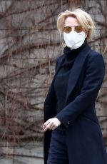 GILLIAN ANDERSON with Her Dog at a Hotel in Prague 03/03/2021