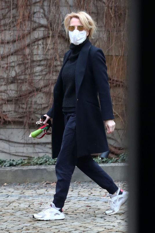 GILLIAN ANDERSON with Her Dog at a Hotel in Prague 03/03/2021