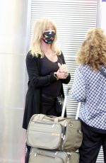 GOLDIE HAWN Arrives at Reagan National Airport in Washington 05/28/2021