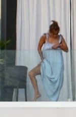 JENNIFER LOPEZ on Balcony of Her Miami Beach Waterfront Mansion 05/23/2021