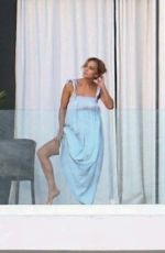 JENNIFER LOPEZ on Balcony of Her Miami Beach Waterfront Mansion 05/23/2021