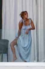 JENNIFER LOPEZ on Balcony of Her Miami Beach Waterfront Mansion 05/23/2021
