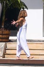 JENNIFER LOPEZ Stretches at Waterfront in Miami 05/25/2021