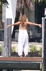 JENNIFER LOPEZ Stretches at Waterfront in Miami 05/25/2021