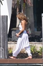 JENNIFER LOPEZ Stretches at Waterfront in Miami 05/25/2021