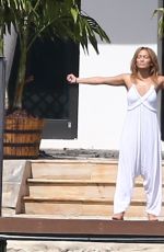 JENNIFER LOPEZ Stretches at Waterfront in Miami 05/25/2021