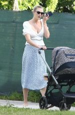 KARLIE KLOSS Out and About in Miami 05/11/2021