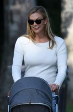 KARLIE KLOSS Out with Her Baby in Miami 05/26/2021