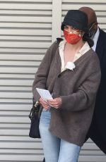 KATIE HOLMES Arrives at JFK Airport in New York 05/09/2021