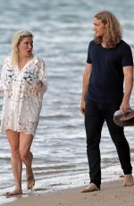 KESHA and Brad Ashenfelter Out at a Beach in Hawaii 05/13/2021