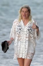KESHA and Brad Ashenfelter Out at a Beach in Hawaii 05/13/2021