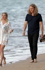 KESHA and Brad Ashenfelter Out at a Beach in Hawaii 05/13/2021