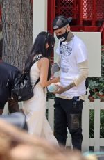 KOURTNEY KARDASHIAN and Travis Barker at Disneyland in Anaheim 05/19/2021