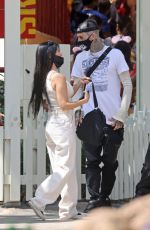 KOURTNEY KARDASHIAN and Travis Barker at Disneyland in Anaheim 05/19/2021