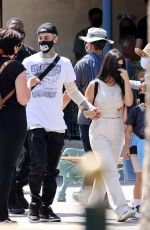 KOURTNEY KARDASHIAN and Travis Barker at Disneyland in Anaheim 05/19/2021