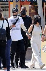 KOURTNEY KARDASHIAN and Travis Barker at Disneyland in Anaheim 05/19/2021