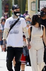 KOURTNEY KARDASHIAN and Travis Barker at Disneyland in Anaheim 05/19/2021