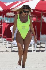 LARSA PIPPEN in a Neon Yellow Swimsuit at a Beach in Miami 05/28/2021