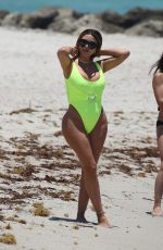 LARSA PIPPEN in a Neon Yellow Swimsuit at a Beach in Miami 05/28/2021