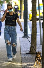 LILI REINHART in Ripped Denim Out with Her Dog in Vancouver 05/02/2021