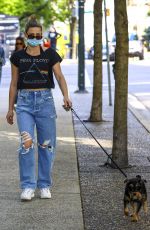 LILI REINHART in Ripped Denim Out with Her Dog in Vancouver 05/02/2021