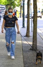 LILI REINHART in Ripped Denim Out with Her Dog in Vancouver 05/02/2021