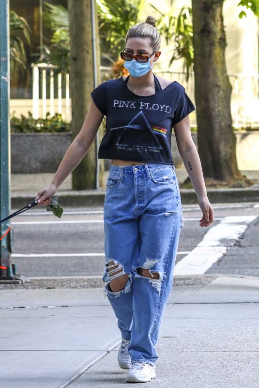 LILI REINHART in Ripped Denim Out with Her Dog in Vancouver 05/02/2021
