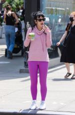 LILY ALLEN in a Pink Sweater and Purple Leggings Out in New York 05/20/2021