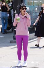 LILY ALLEN in a Pink Sweater and Purple Leggings Out in New York 05/20/2021