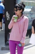 LILY ALLEN in a Pink Sweater and Purple Leggings Out in New York 05/20/2021