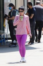 LILY ALLEN in a Pink Sweater and Purple Leggings Out in New York 05/20/2021