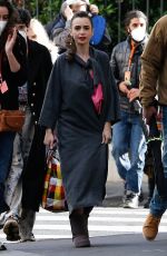 LILY COLLINS Arrives on the set of Emily in Paris in Paris 05/21/2021