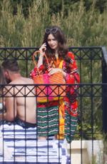 LILY COLLINS in Bikini on the Set of Emily in Paris in Paris 05/03/2021