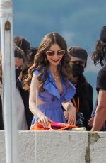 LILY COLLINS on the Set of Emily in Paris 05/09/2021