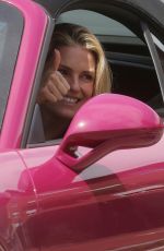MICHELLE HUNZIKER Out Driving Her Porsche in Milan 05/12/2021