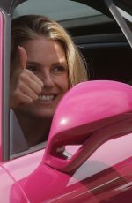 MICHELLE HUNZIKER Out Driving Her Porsche in Milan 05/12/2021