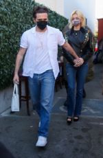 NICOLA PELTZ and Brooklyn Beckham at Craig